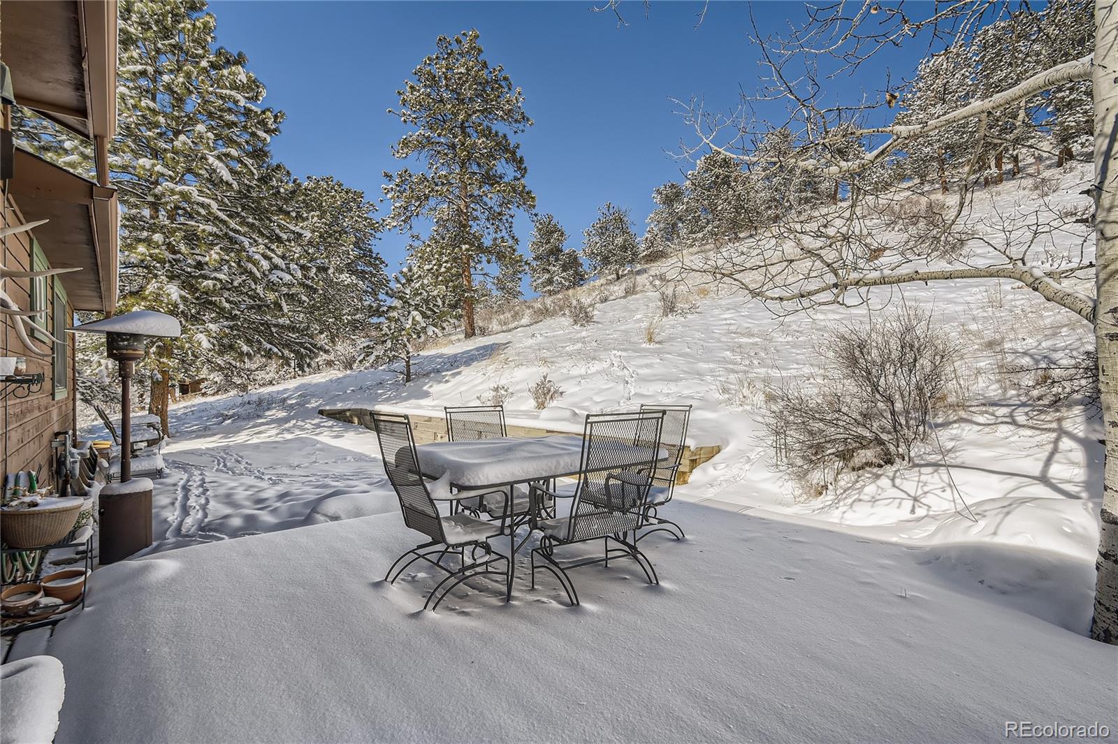 1749 County Road 72 Bailey, CO 80421 - Photo 24 of 35 a view of an outdoor space with table and chairs