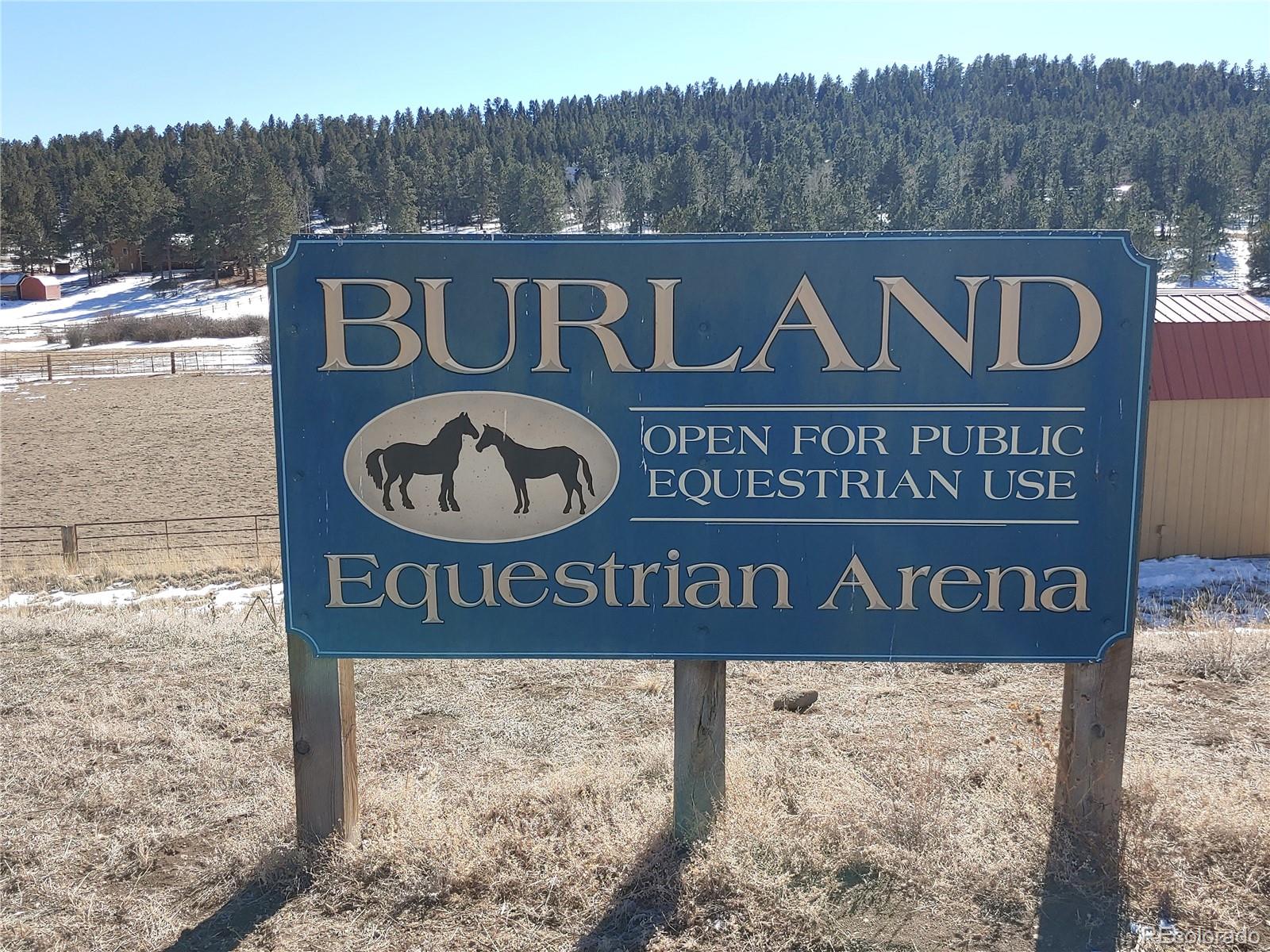 1749 County Road 72 Bailey, CO 80421 - Photo 33 of 35 a sign that is on the side of the wall