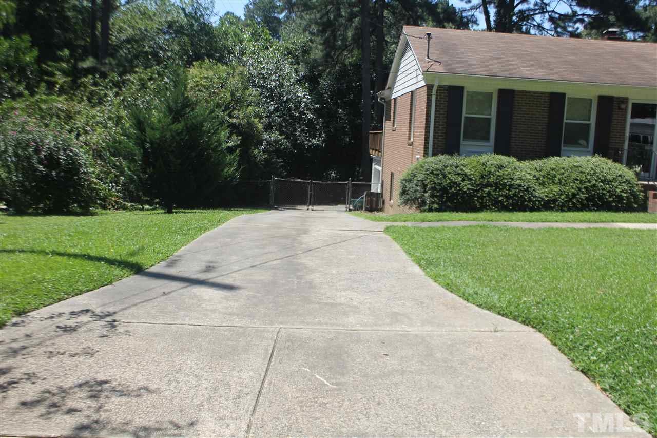 301 Northfield Drive Raleigh, NC 27609 - Photo 2 of 24 a house with garden in front of it