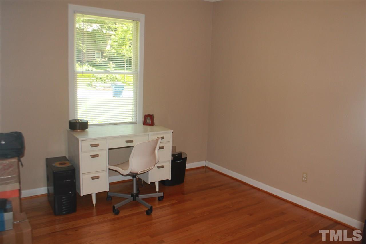 301 Northfield Drive Raleigh, NC 27609 - Photo 12 of 24 a view of a workspace with furniture and a window