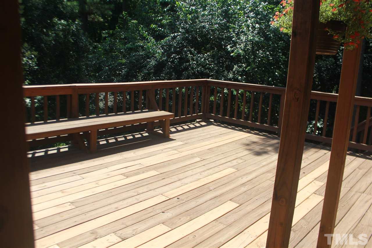 301 Northfield Drive Raleigh, NC 27609 - Photo 15 of 24 a view of a wooden deck
