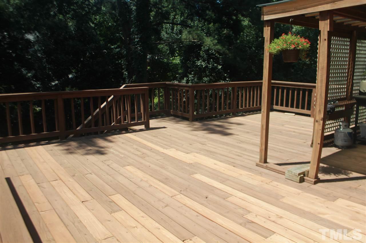 301 Northfield Drive Raleigh, NC 27609 - Photo 16 of 24 a view of deck with wooden floor and iron fence