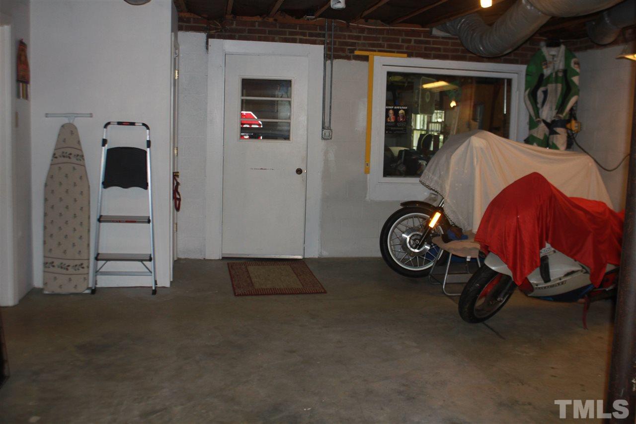 301 Northfield Drive Raleigh, NC 27609 - Photo 20 of 24 a view of car parked in garage