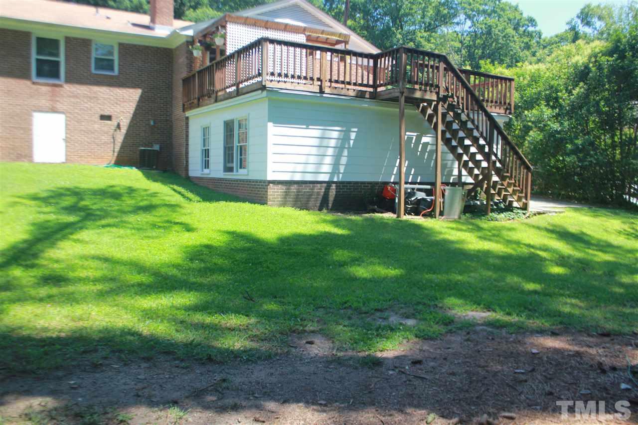 301 Northfield Drive Raleigh, NC 27609 - Photo 24 of 24 a view of a house with a yard