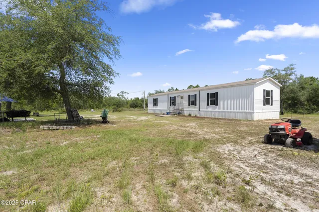 $174,900 | 21835 Lake McKenzie Boulevard, Altha, FL 32421