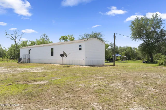 $174,900 | 21835 Lake McKenzie Boulevard, Altha, FL 32421