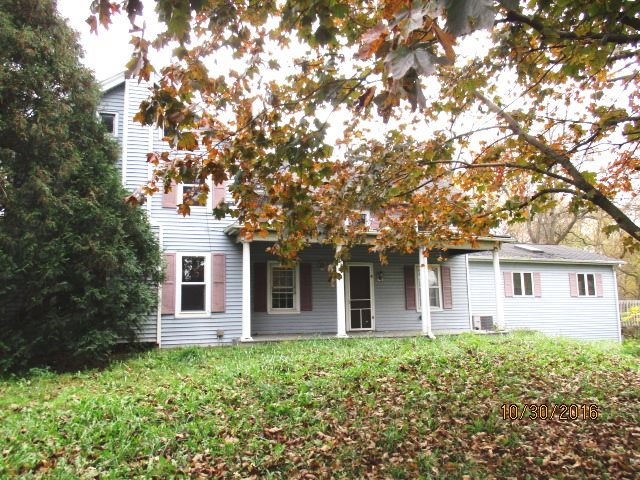 2697 North Unity Road Lena, IL 61048 - Photo 1 of 16 front view of a house with a tree