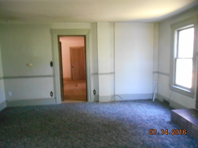 2697 North Unity Road Lena, IL 61048 - Photo 13 of 16 an empty room with windows