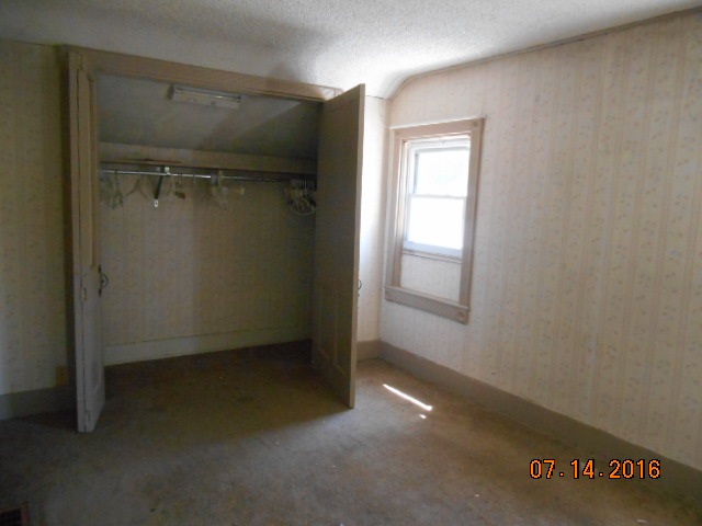 2697 North Unity Road Lena, IL 61048 - Photo 15 of 16 an empty room with a door