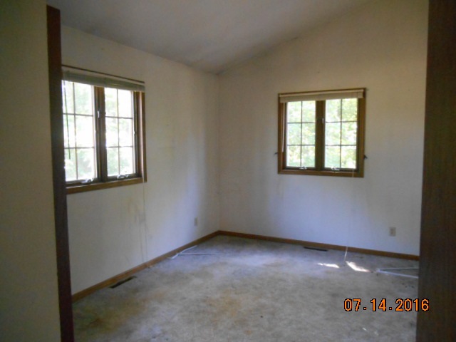 2697 North Unity Road Lena, IL 61048 - Photo 7 of 16 an empty room with windows