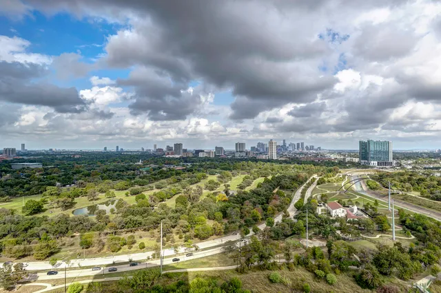 a view of a swimming pool with an outdoor seating