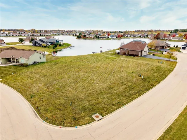 an aerial view of a residential building with outdoor space