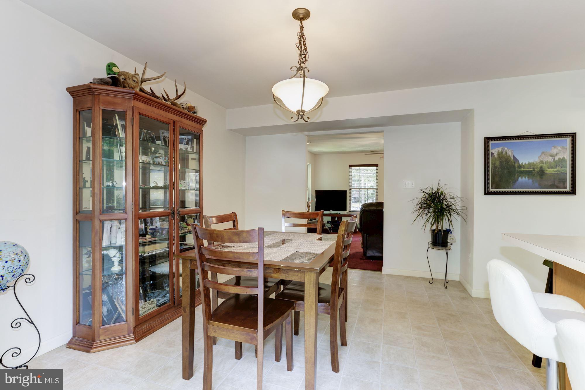 1095 Rimrock Road Lusby, MD 20657 - Photo 11 of 27 Large dining table space