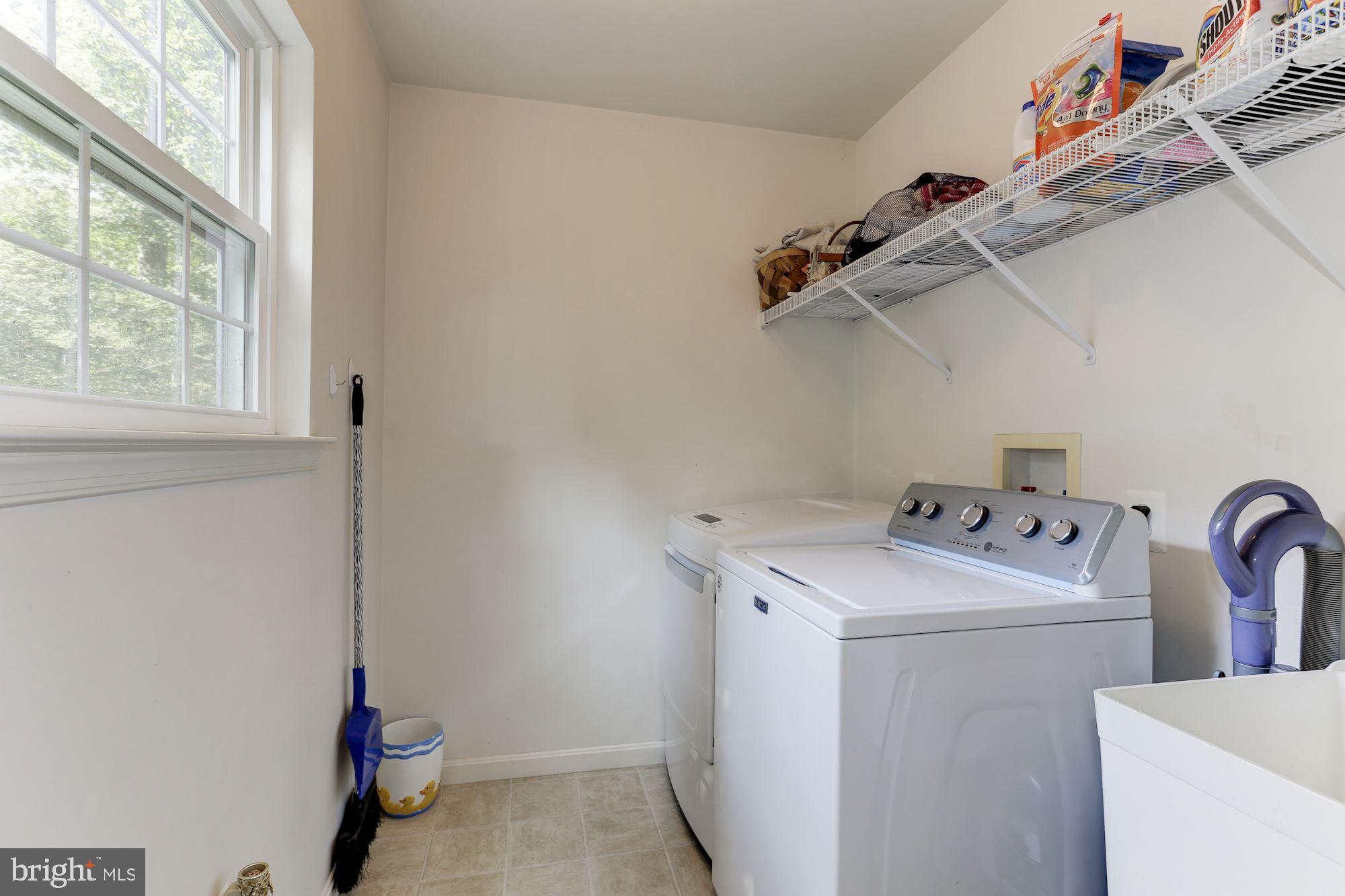 1095 Rimrock Road Lusby, MD 20657 - Photo 14 of 27 Laundry room with wash sink