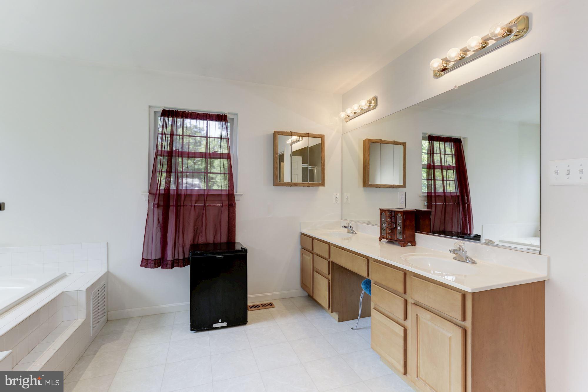 1095 Rimrock Road Lusby, MD 20657 - Photo 18 of 27 Plenty of getting ready space with dual vanities