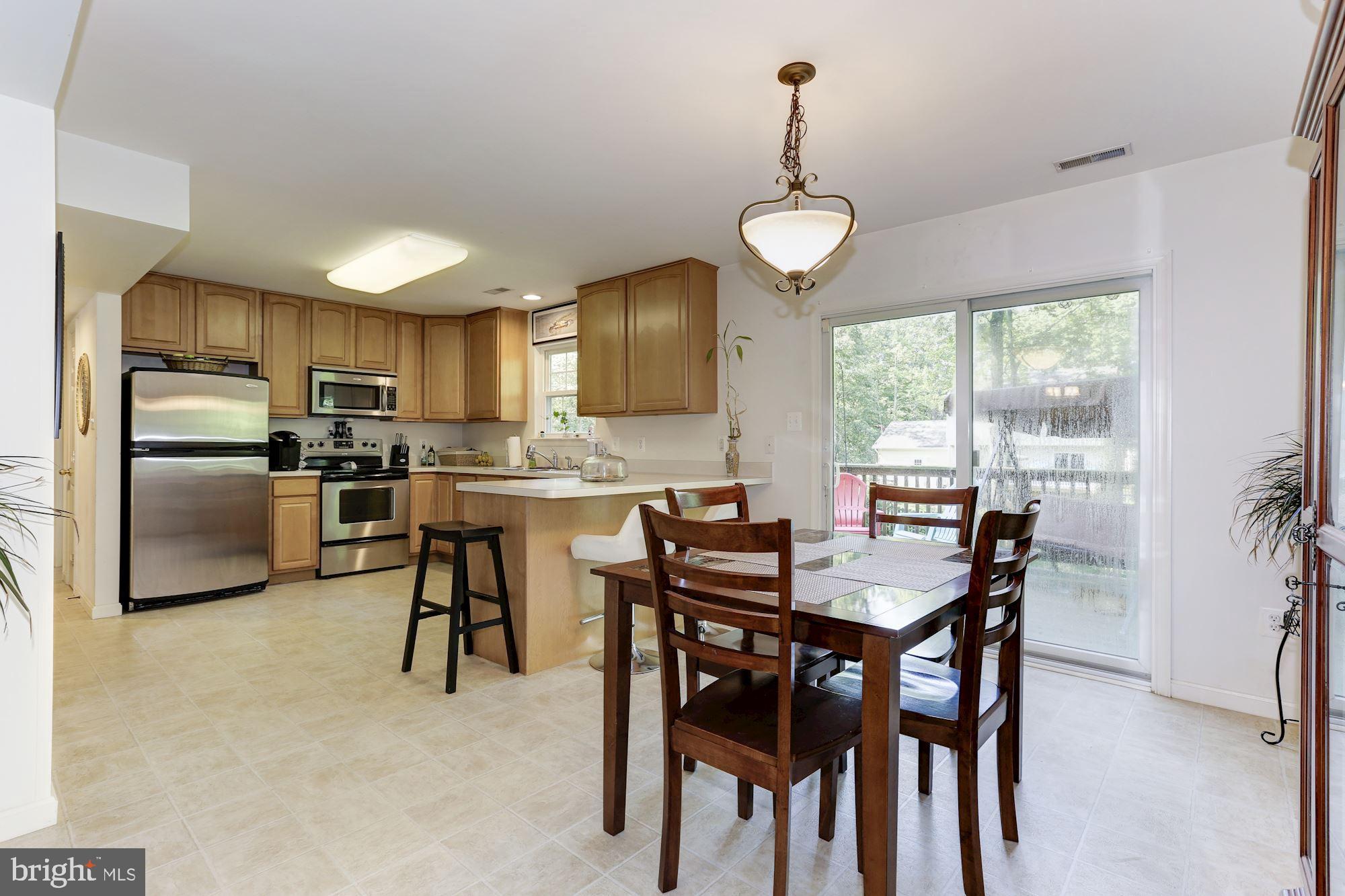 1095 Rimrock Road Lusby, MD 20657 - Photo 9 of 27 Opens to rear deck