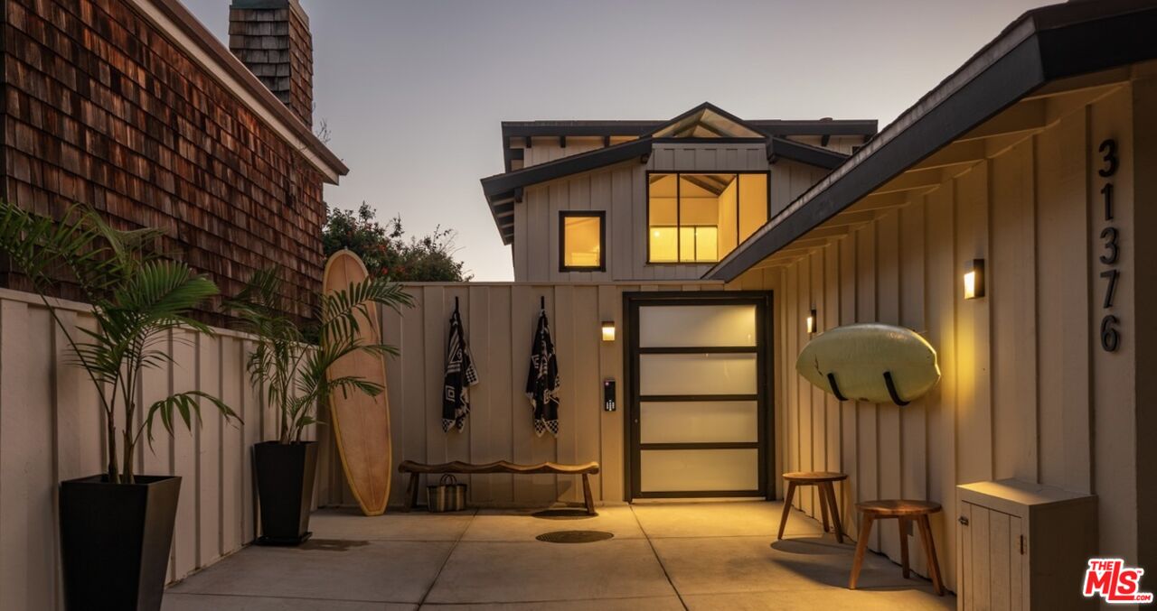 31376 Broad Beach Road Malibu, CA 90265 - Photo 2 of 32 a front view of a house with parking