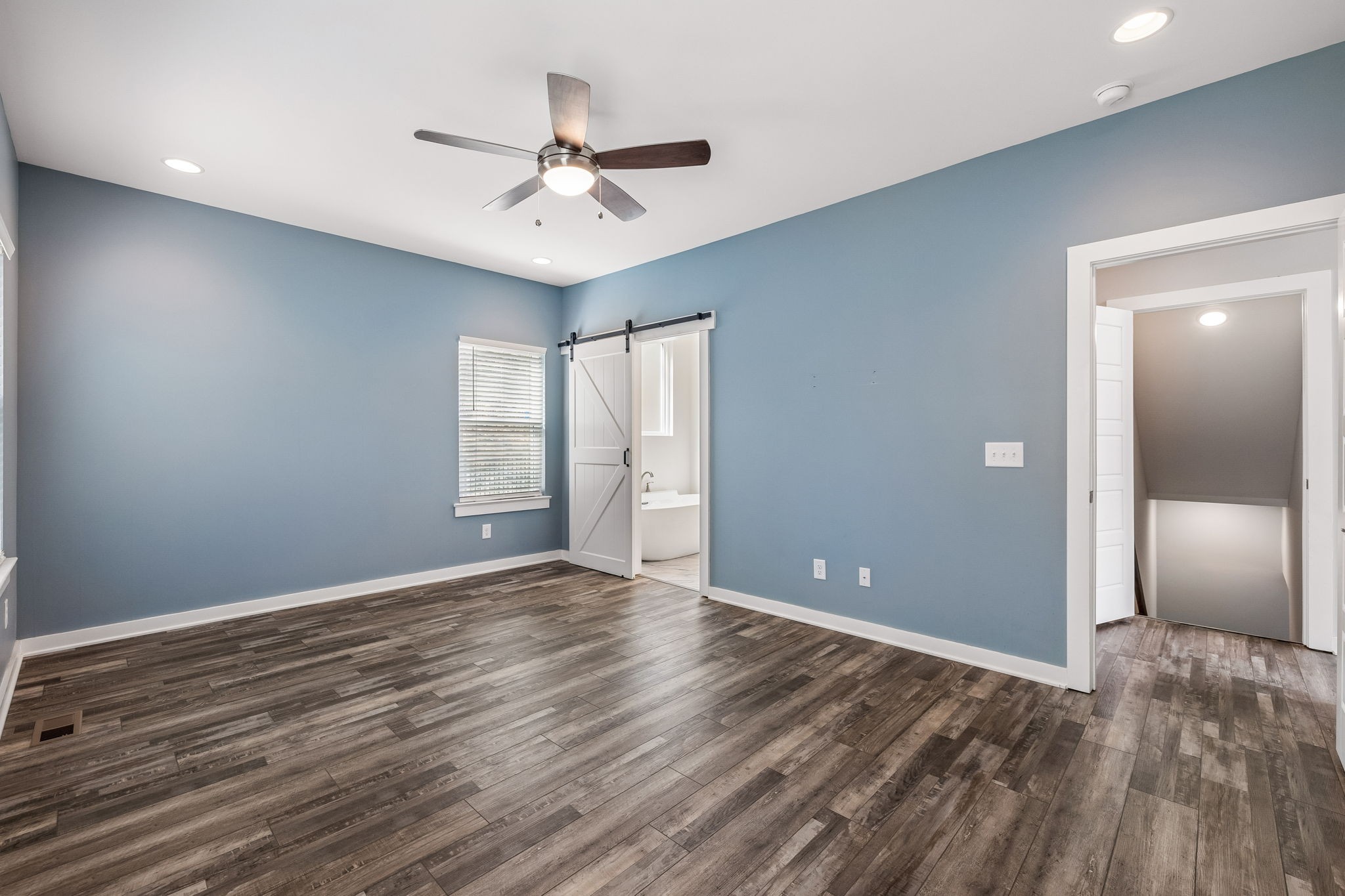 805 Weeping Willow Road Hendersonville, TN 37075 - Photo 27 of 73 a view of an empty room with window and wooden floor