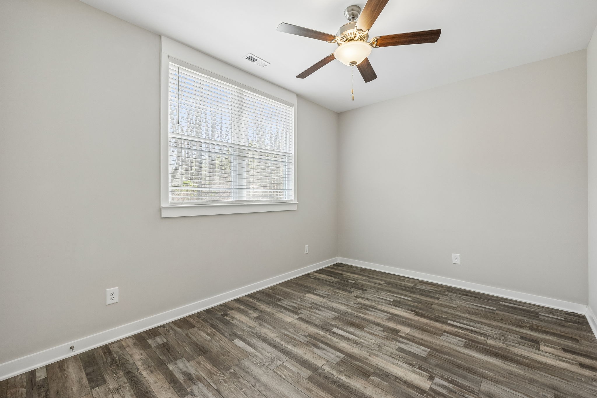 805 Weeping Willow Road Hendersonville, TN 37075 - Photo 37 of 73 an empty room with a window and a fan