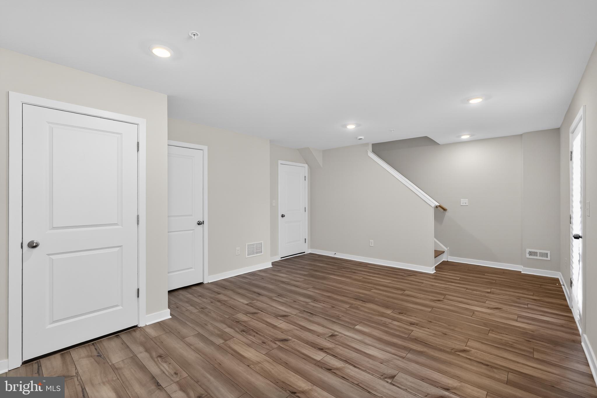 70 Continental Way Bridgeport, PA 19405 - Photo 19 of 30 a view of an empty room with wooden floor