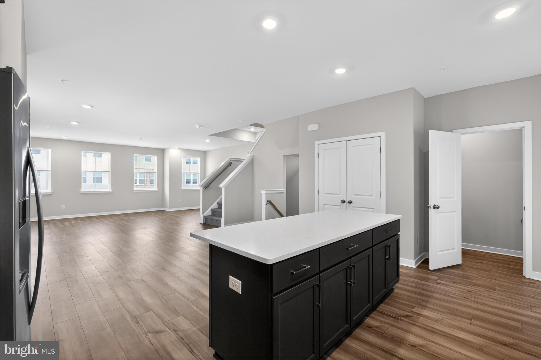 70 Continental Way Bridgeport, PA 19405 - Photo 26 of 30 a kitchen with a sink cabinets and wooden floor