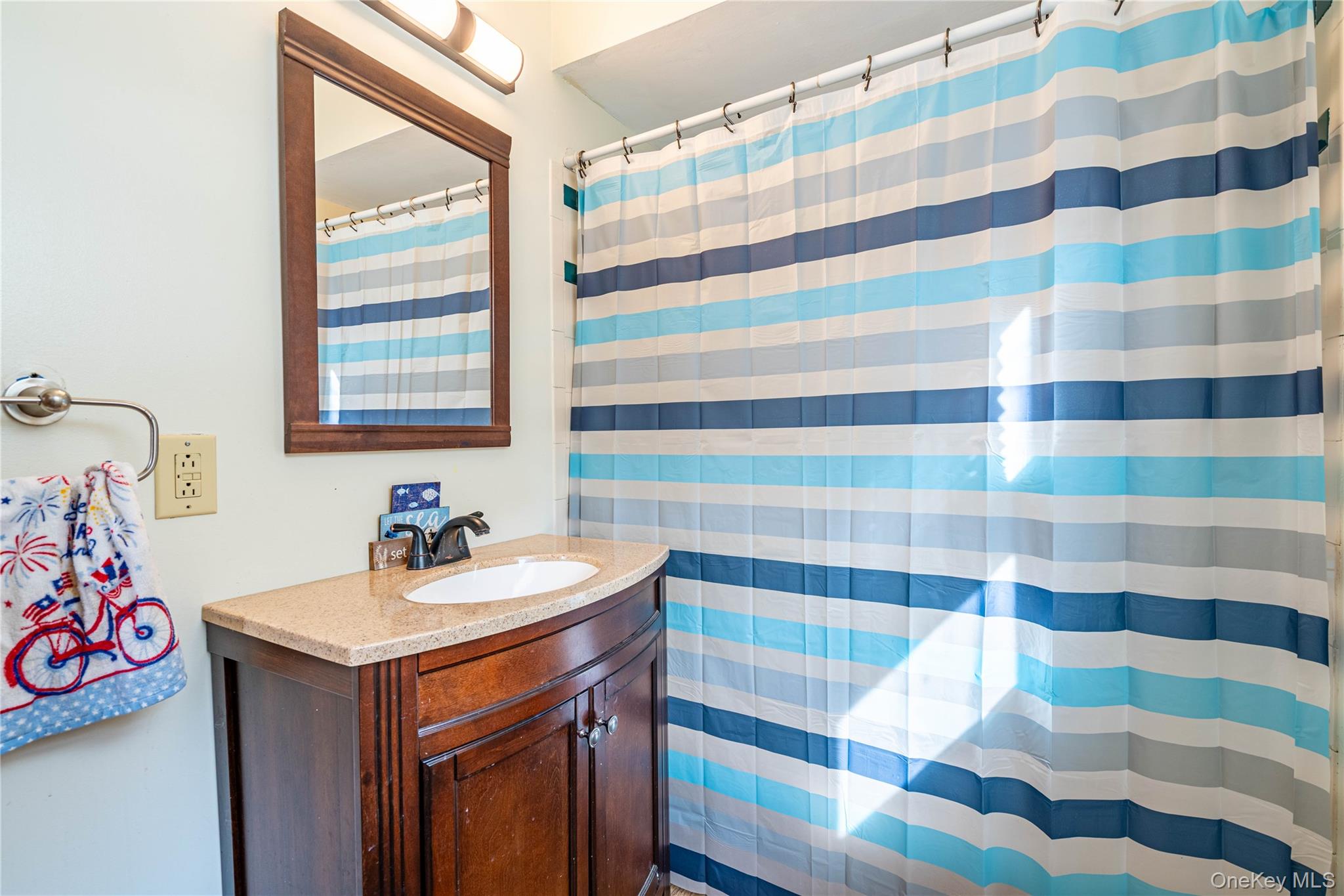 67 Whitlock Road Otisville, NY 10963 - Photo 18 of 50 a bathroom with a sink and a mirror