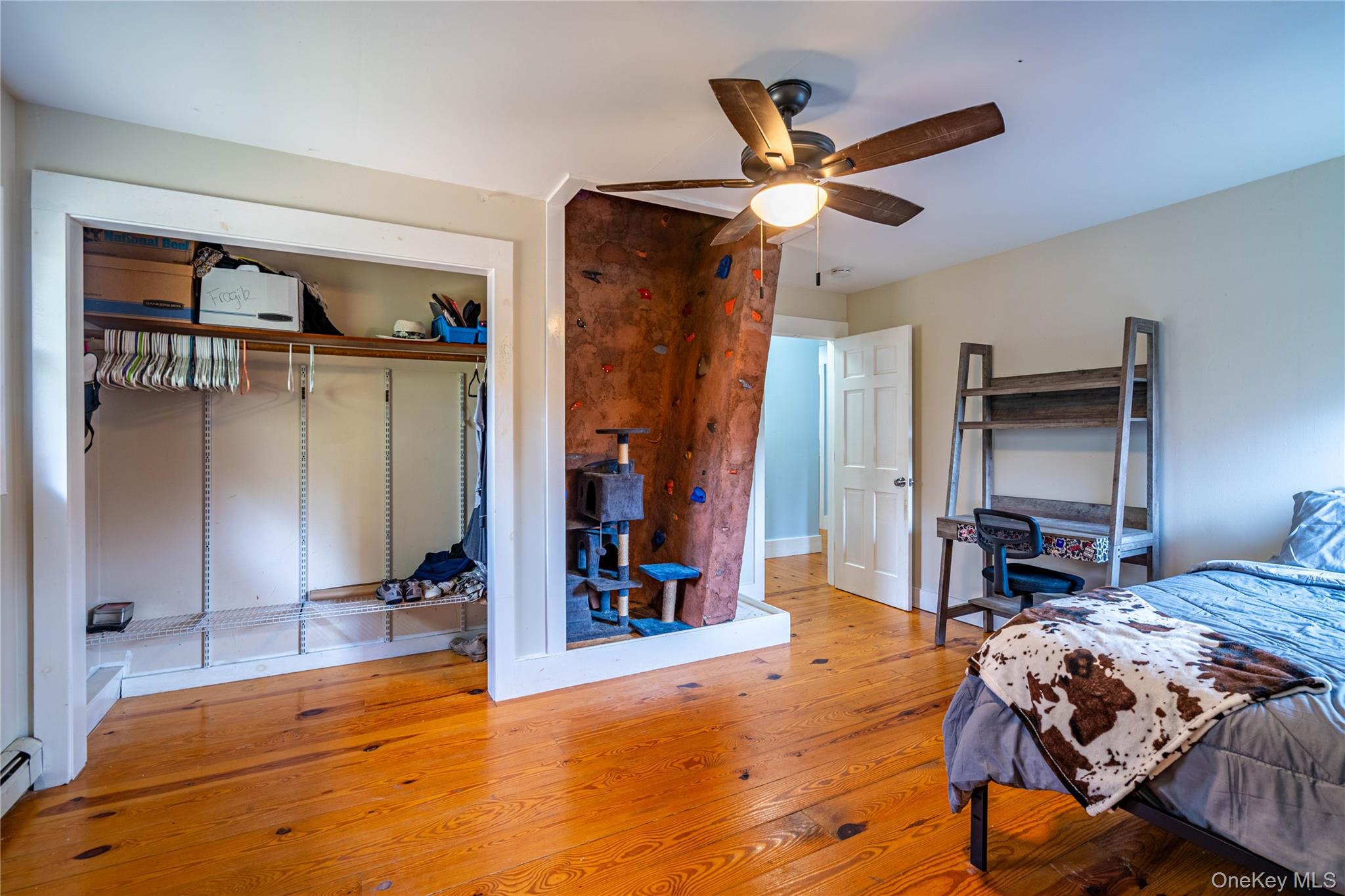 67 Whitlock Road Otisville, NY 10963 - Photo 24 of 50 a bed room with a bed and a ceiling fan