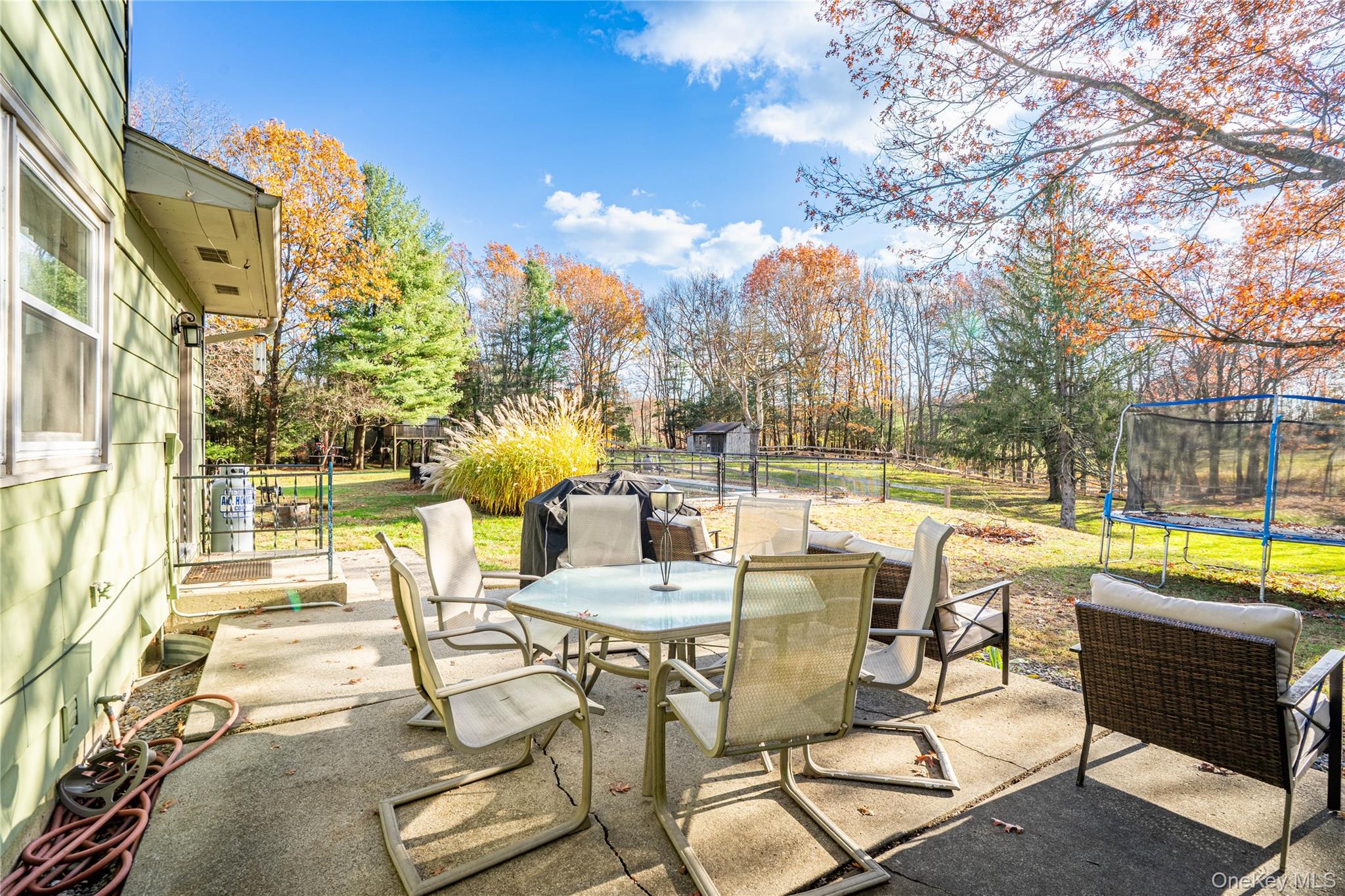 67 Whitlock Road Otisville, NY 10963 - Photo 38 of 50 a view of a swimming pool with outdoor seating and city view