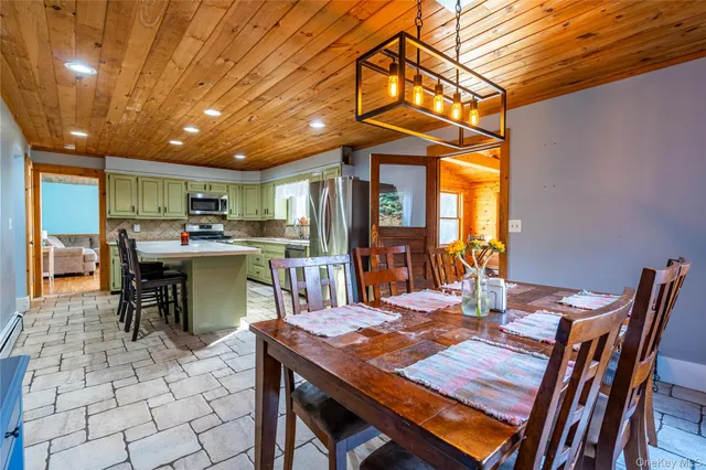 a view of a dining room with furniture