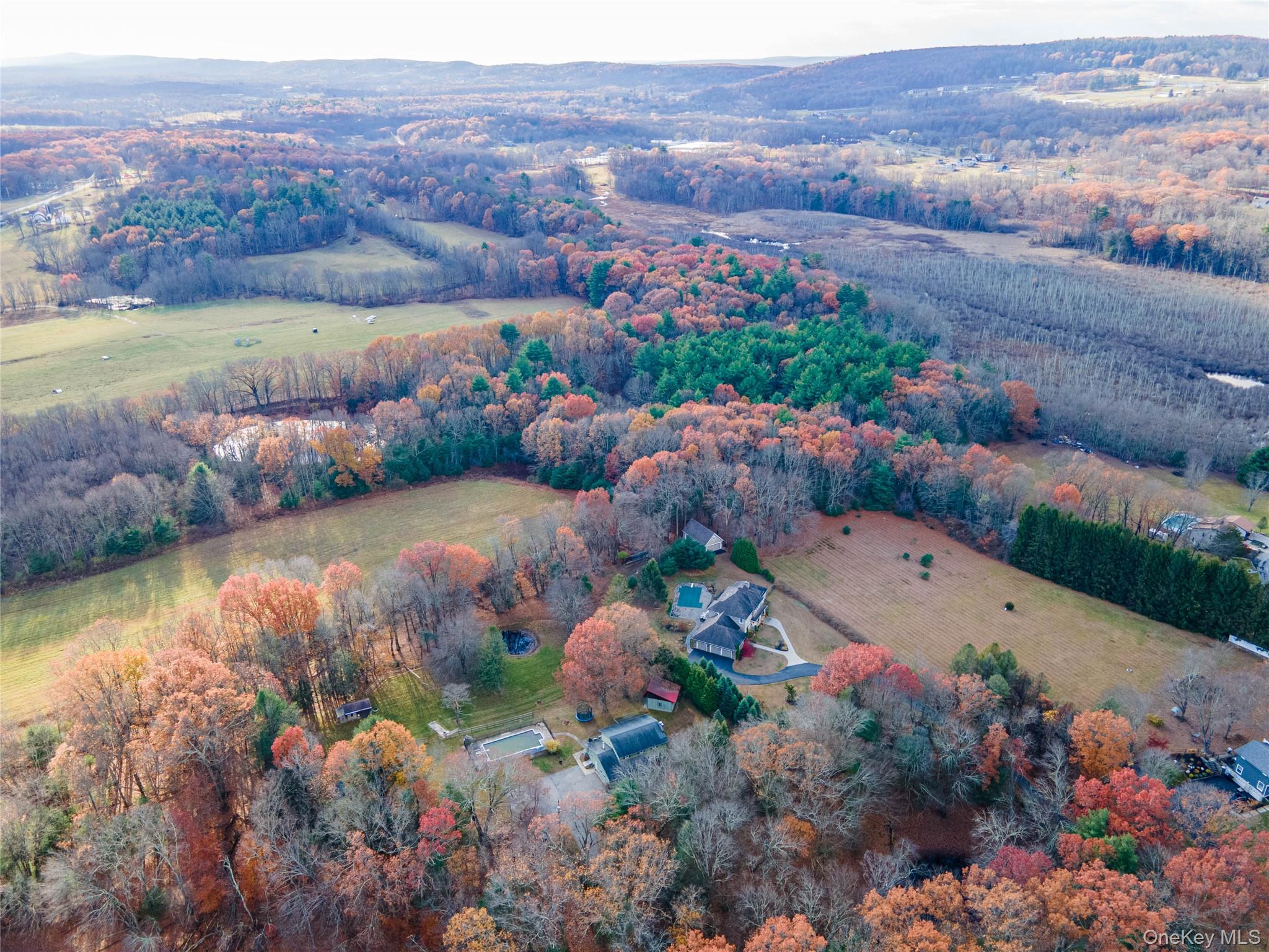 67 Whitlock Road Otisville, NY 10963 - Photo 45 of 50 an aerial view of lake residential house with swimming pool and green space