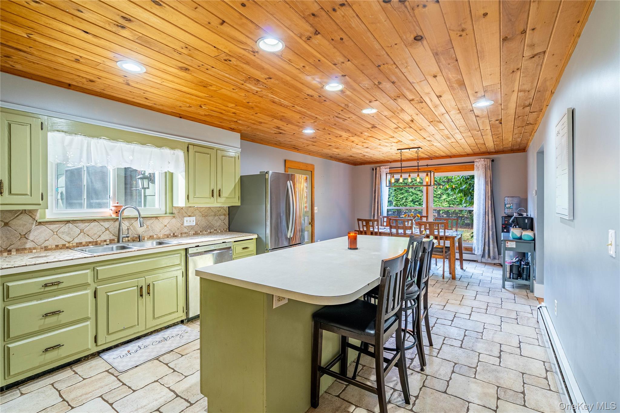 67 Whitlock Road Otisville, NY 10963 - Photo 8 of 50 a kitchen with a table and chairs in it