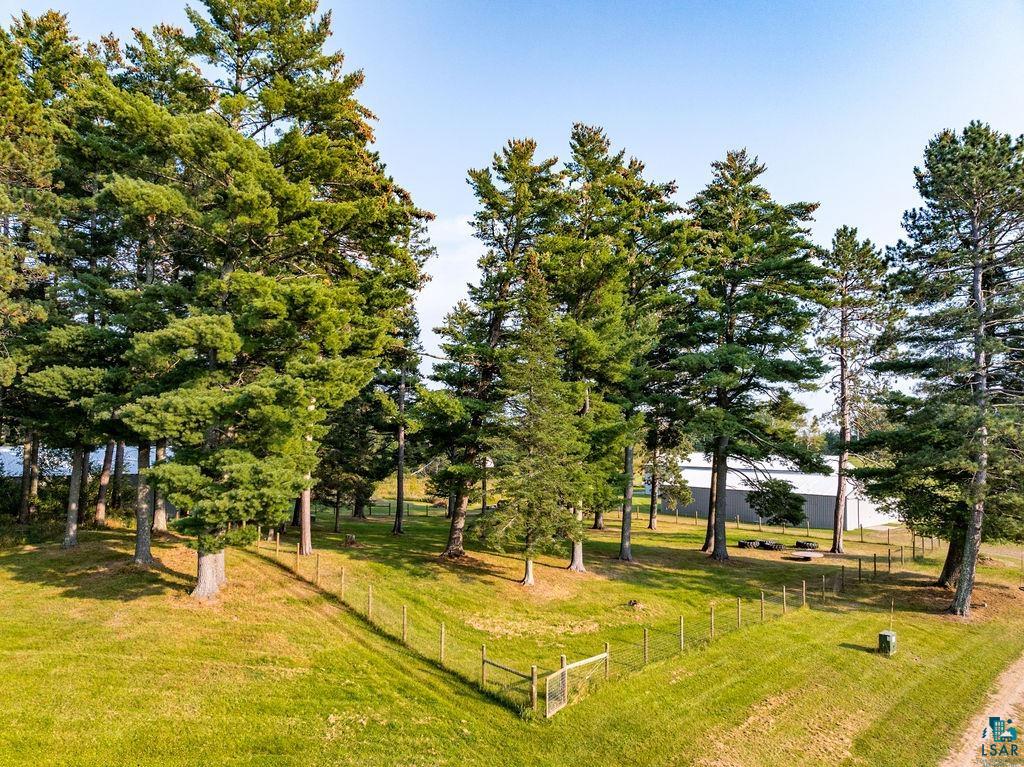 3168 Pioneer Road Barnum, MN 55707 - Photo 40 of 46 Portions of the property have been fenced in and are ready to go for livestock or animals of your choosing. Mature pine trees line the entire property and provide serenity throughout.