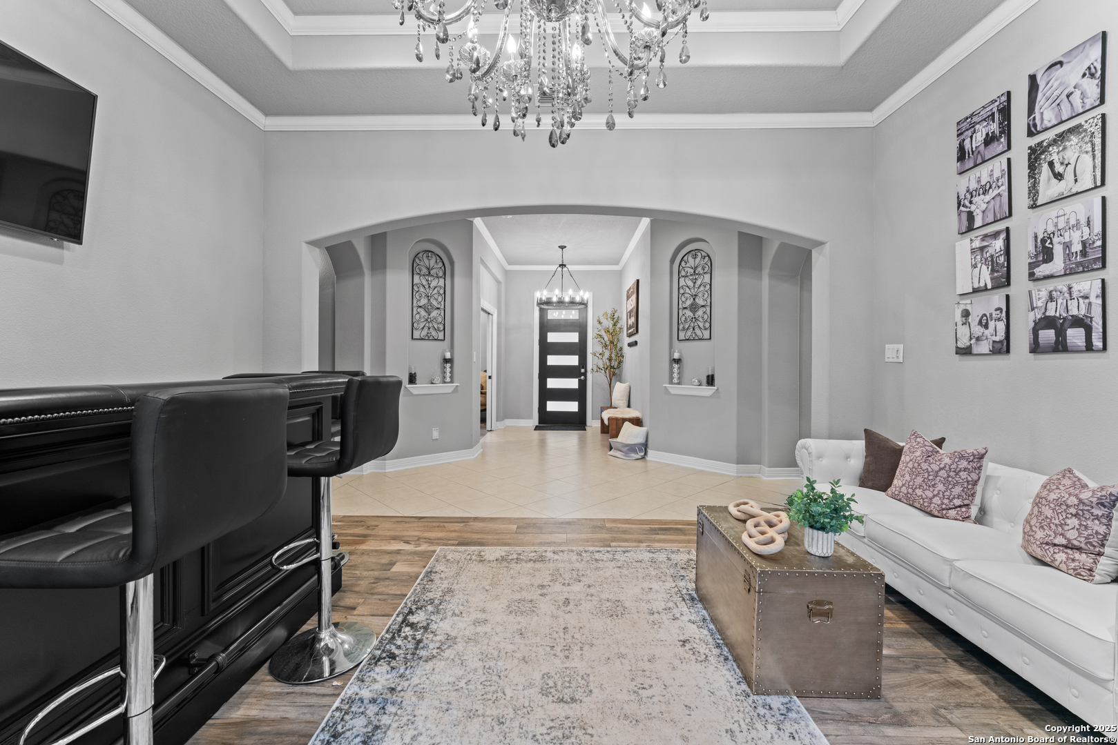 27906 Bogen Road New Braunfels, TX 78132 - Photo 29 of 49 a living room with furniture and a flat screen tv
