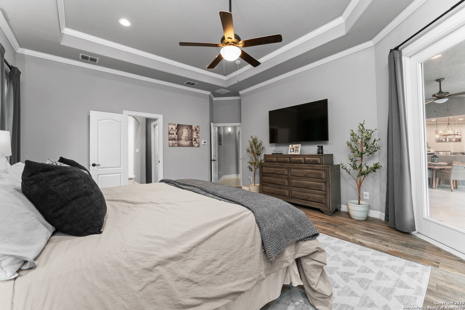 27906 Bogen Road New Braunfels, TX 78132 - Photo 34 of 49 a bedroom with a bed and a flat screen tv