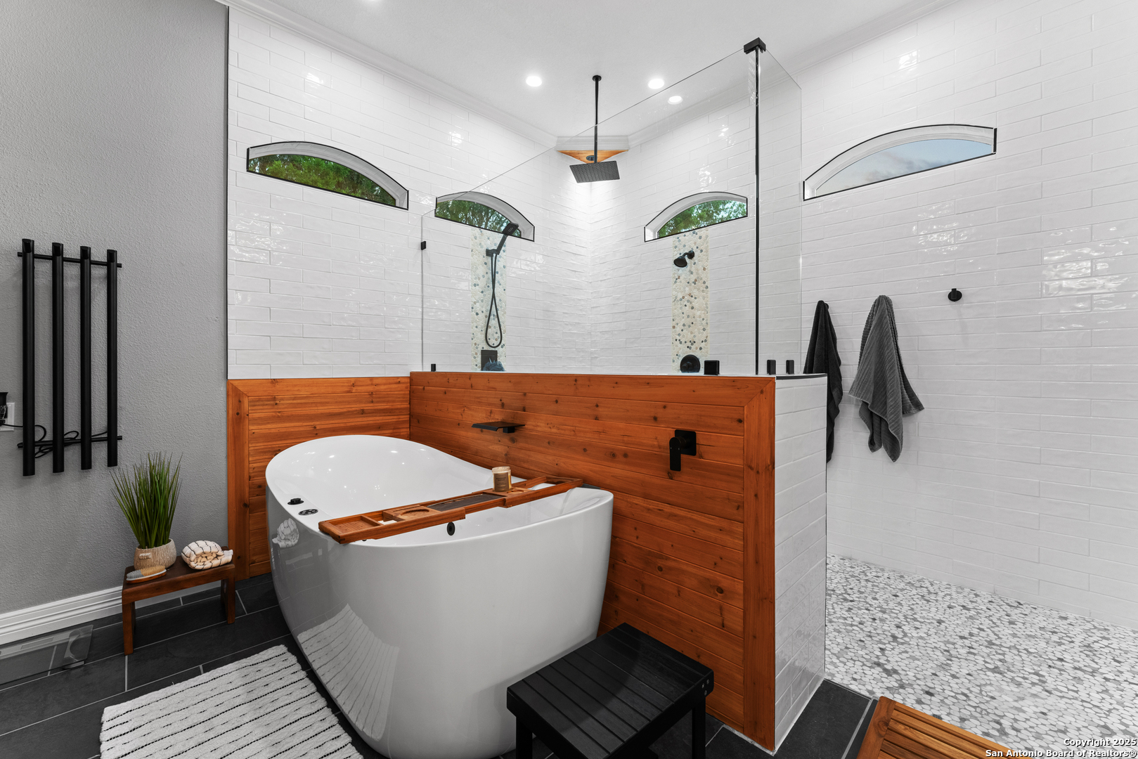 27906 Bogen Road New Braunfels, TX 78132 - Photo 35 of 49 a bathroom with a bathtub and shower