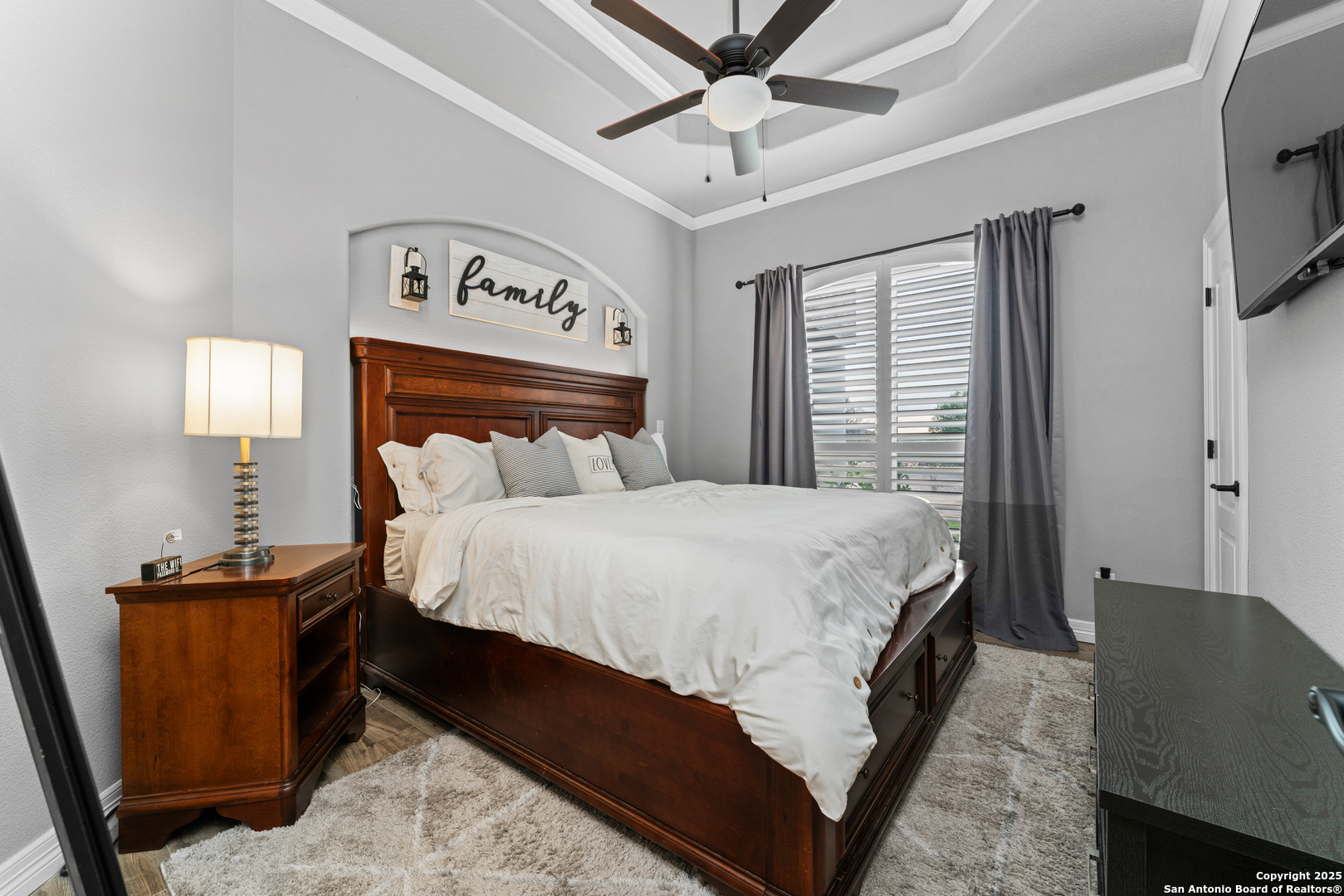 27906 Bogen Road New Braunfels, TX 78132 - Photo 9 of 49 a bed sitting in a bedroom next to a window