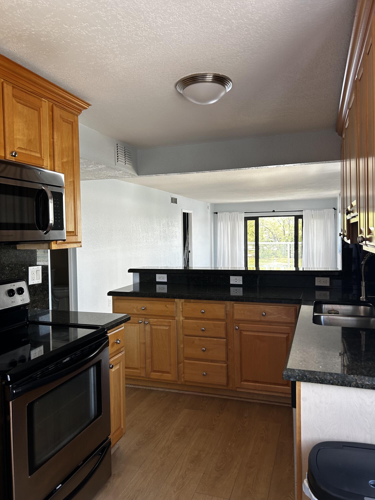 1401 North Riverside Drive, Unit 307 Pompano Beach, FL 33062 - Photo 19 of 29 kitchen from frig