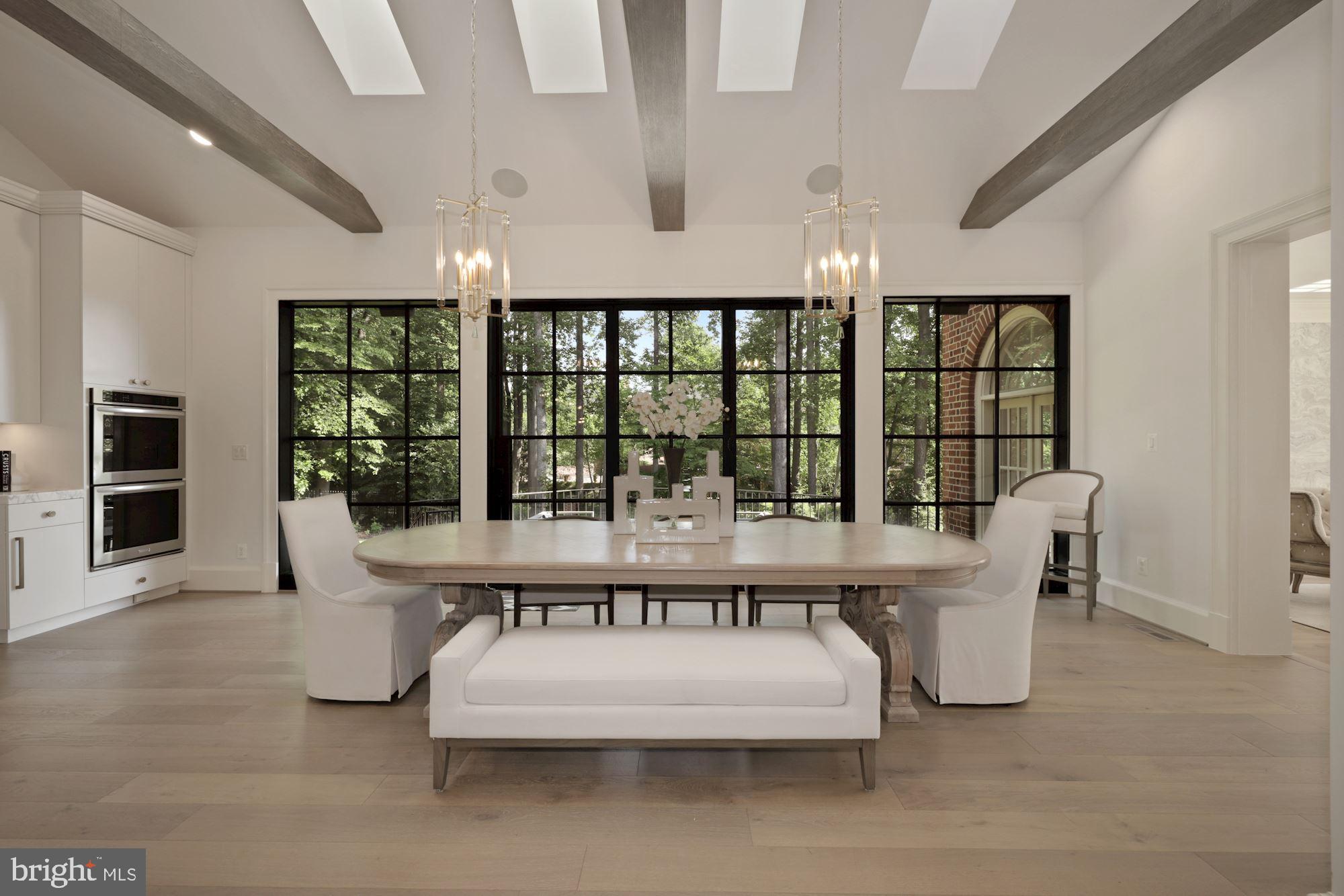 1098 Mill Ridge McLean, VA 22102 - Photo 18 of 62 Breakfast Room with Accordion Door and Oak Beams