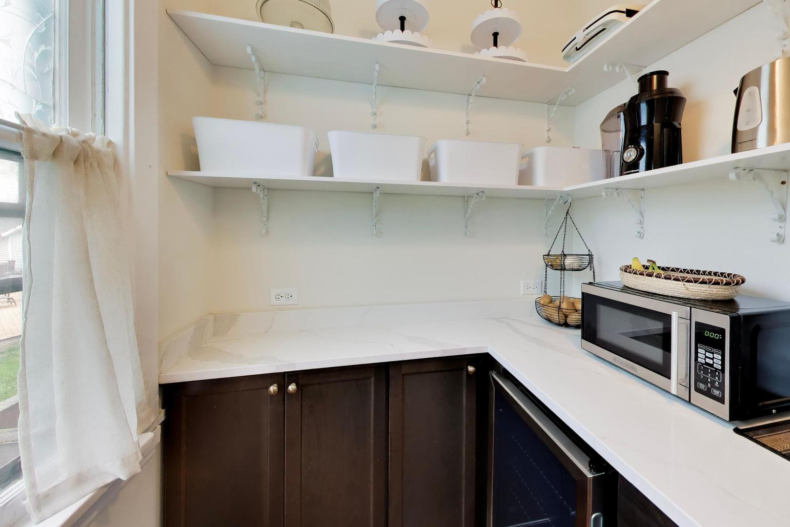 3533 Grand Boulevard Brookfield, IL 60513 - Photo 12 of 40 a kitchen with a cabinets and appliances