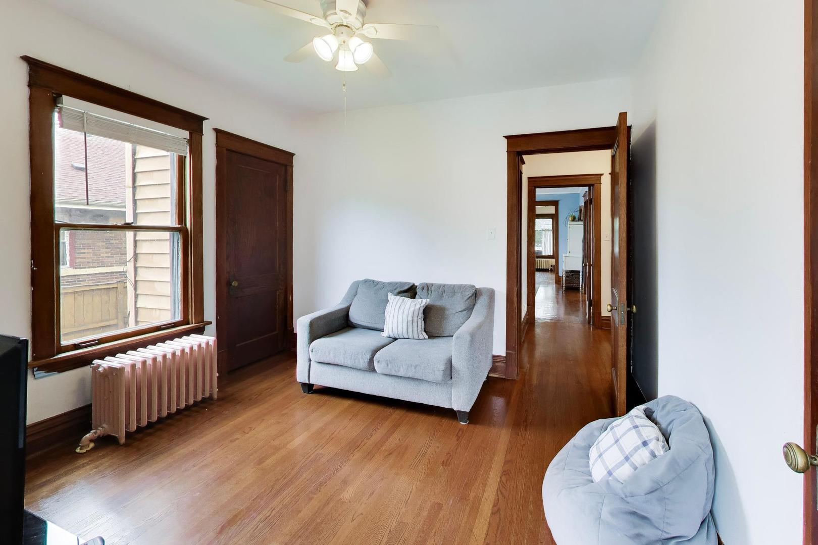 3533 Grand Boulevard Brookfield, IL 60513 - Photo 14 of 40 a living room with furniture and wooden floor