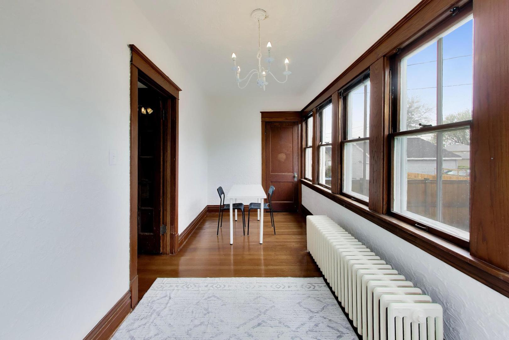 3533 Grand Boulevard Brookfield, IL 60513 - Photo 15 of 40 wooden floor with windows and stairs