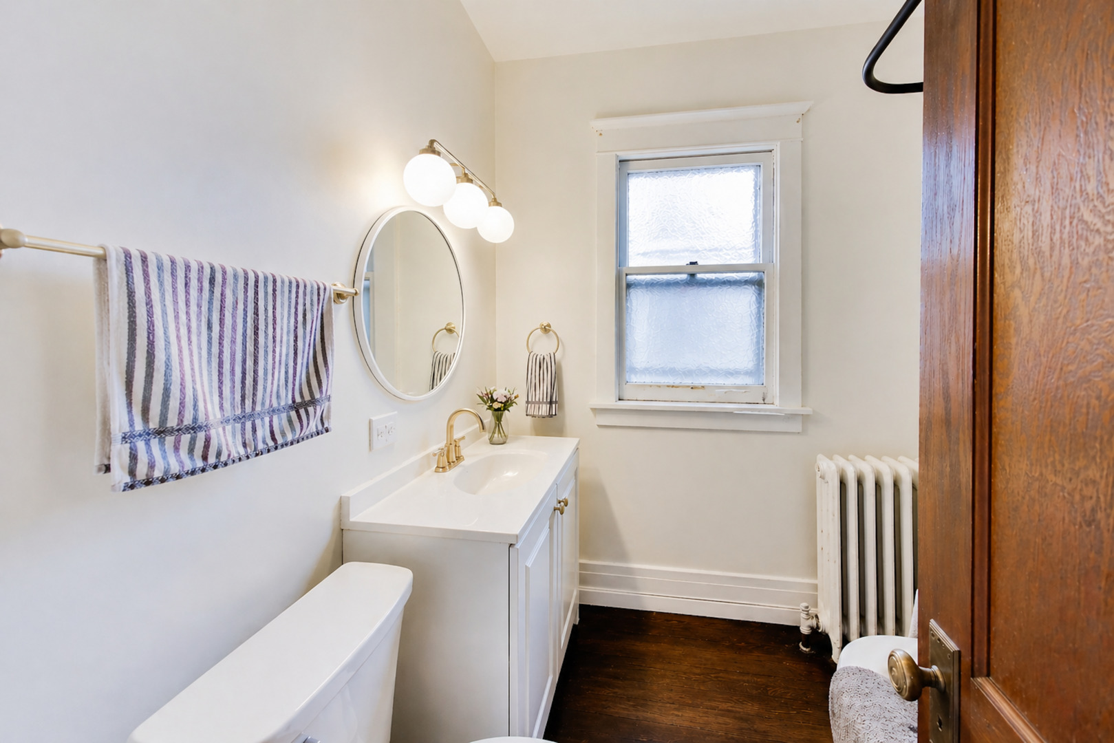 3533 Grand Boulevard Brookfield, IL 60513 - Photo 18 of 40 a bathroom with a sink mirror and toilet
