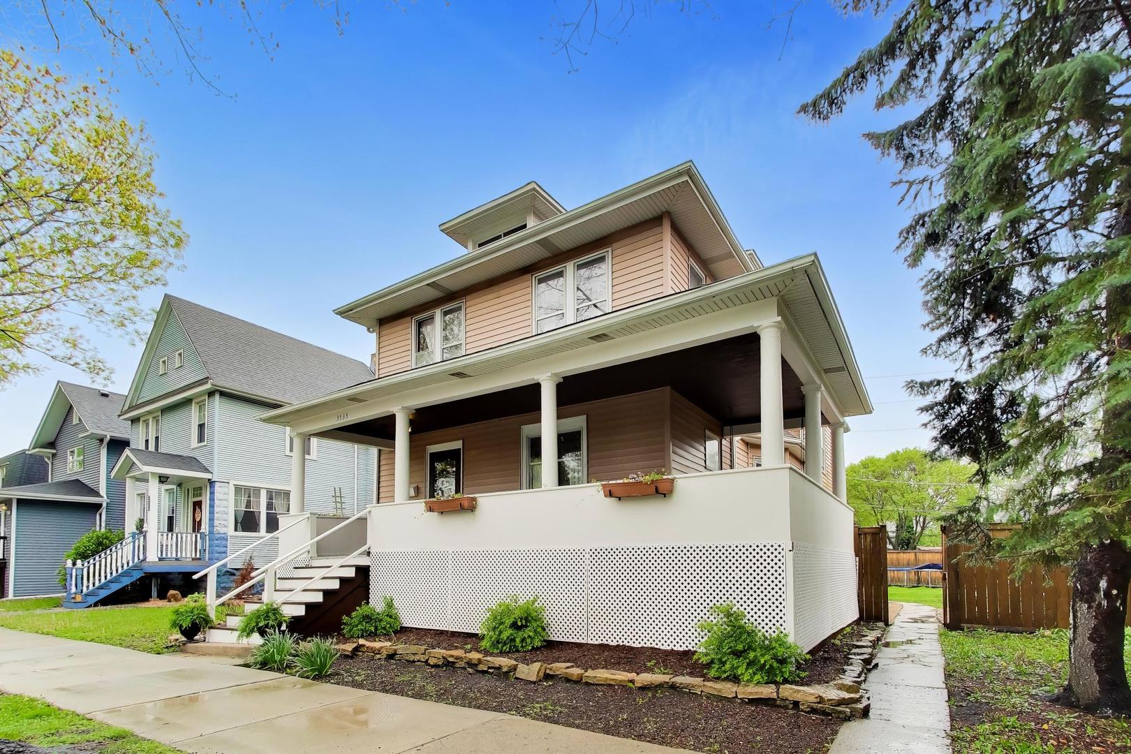 3533 Grand Boulevard Brookfield, IL 60513 - Photo 2 of 40 a front view of a house with a yard