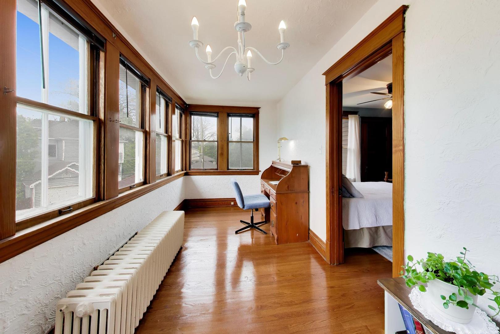 3533 Grand Boulevard Brookfield, IL 60513 - Photo 24 of 40 a view of a hallway with furniture and a window