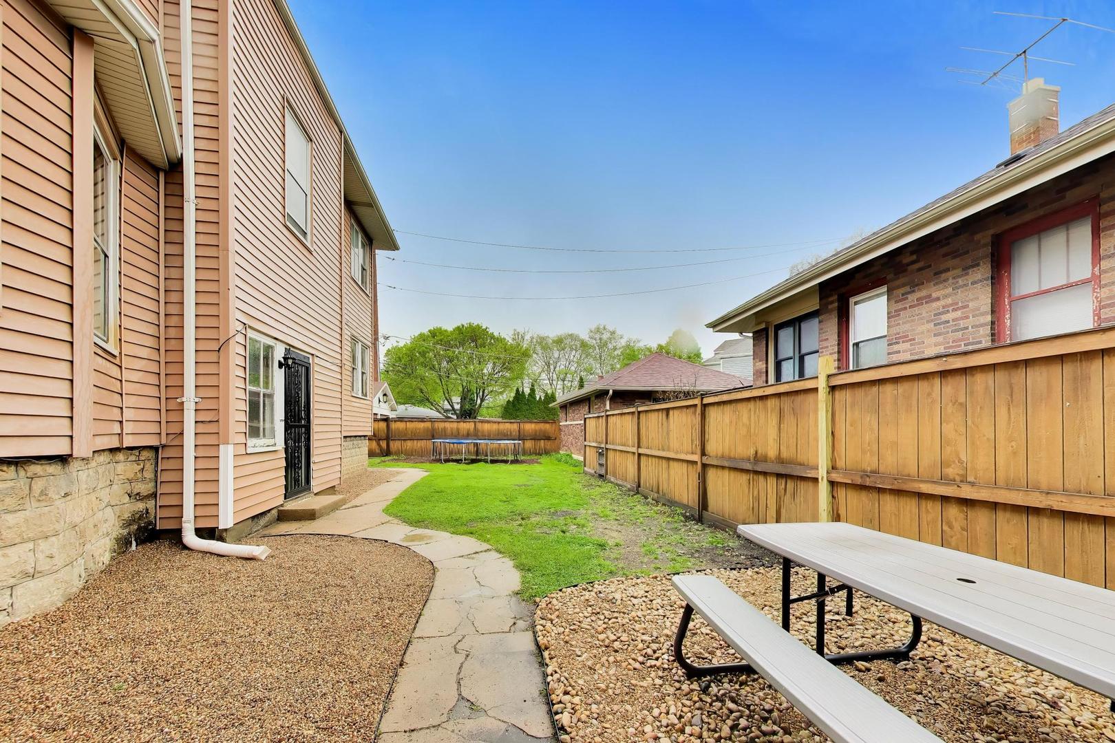 3533 Grand Boulevard Brookfield, IL 60513 - Photo 35 of 40 a view of a porch with a yard