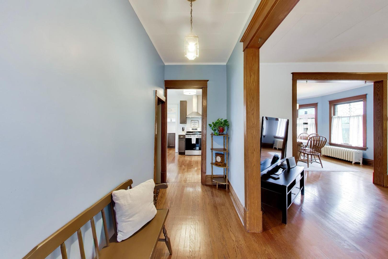 3533 Grand Boulevard Brookfield, IL 60513 - Photo 4 of 40 a view of a livingroom with furniture and hardwood floor
