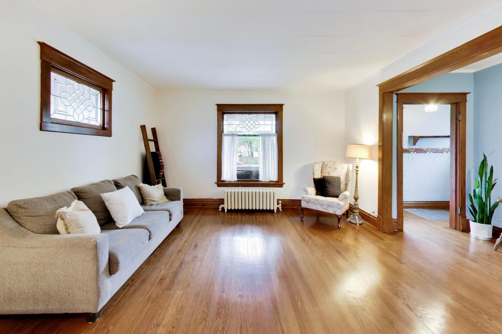 3533 Grand Boulevard Brookfield, IL 60513 - Photo 5 of 40 a living room with furniture and a wooden floor