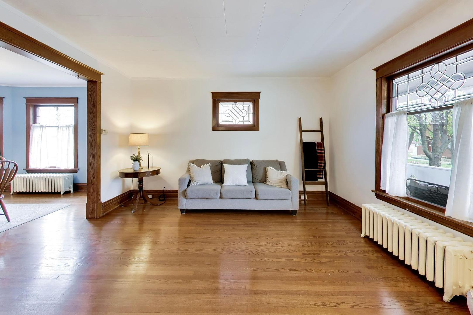 3533 Grand Boulevard Brookfield, IL 60513 - Photo 6 of 40 a living room with furniture and a large window