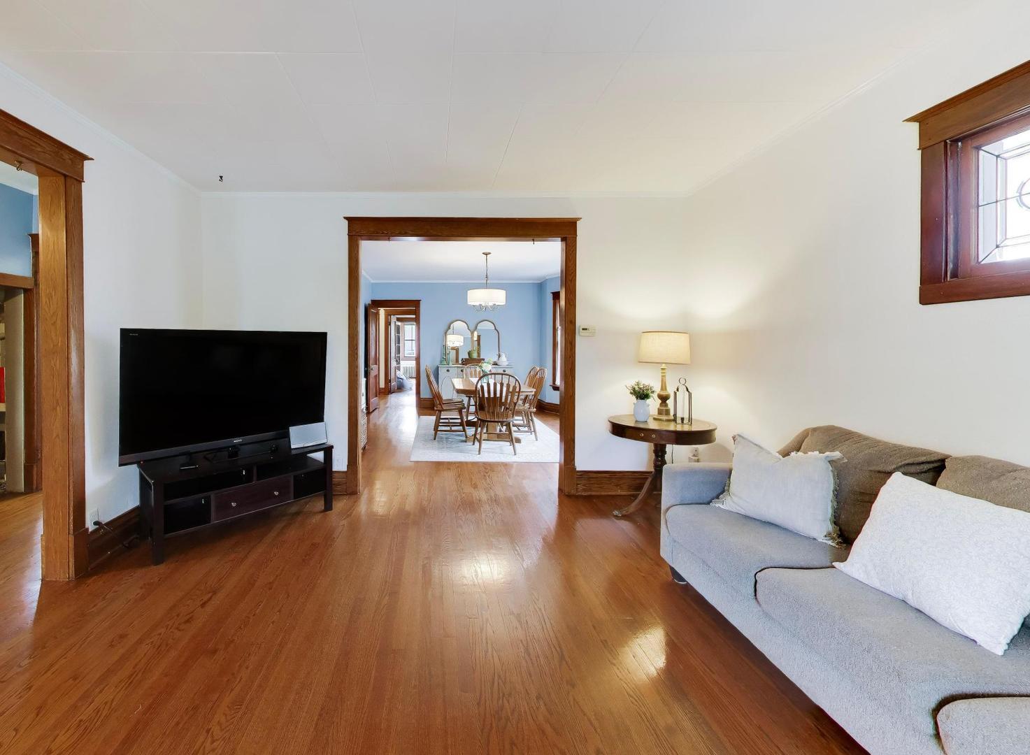 3533 Grand Boulevard Brookfield, IL 60513 - Photo 7 of 40 a living room with furniture and a flat screen tv