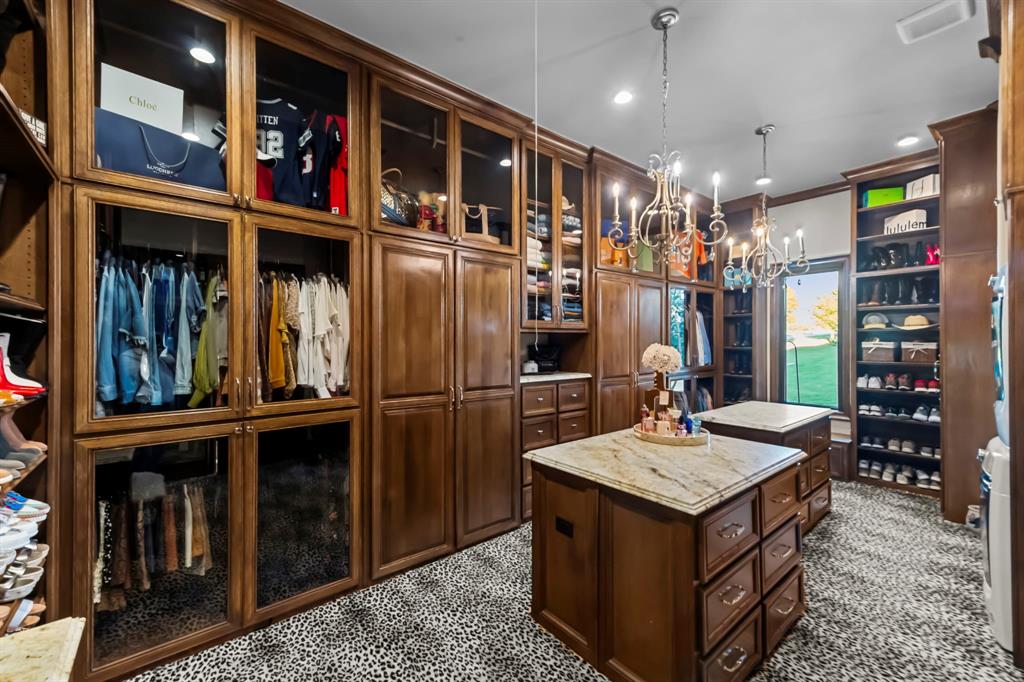 1025 Pecan Ridge Graford, TX 76449 - Photo 19 of 40 Fully custom built furniture and racks in primary closet